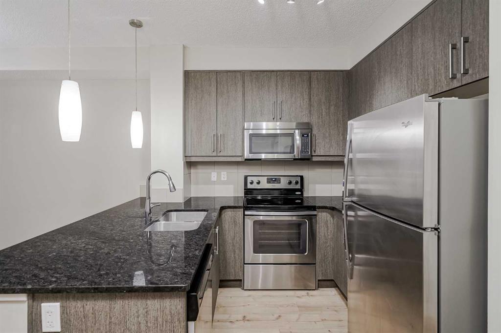 Picture of 205, 402 Marquis Lane SE, Calgary Real Estate Listing