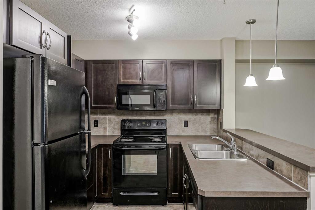 Picture of 2119, 115 Prestwick Villas SE, Calgary Real Estate Listing