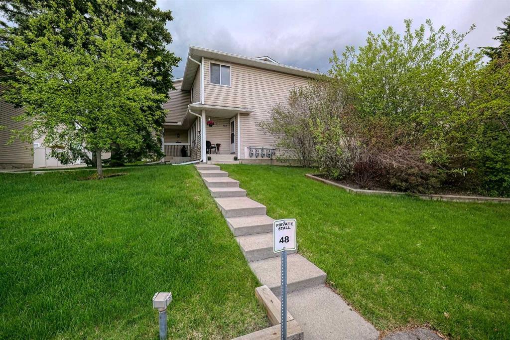Picture of 102 Woodsman Lane SW, Calgary Real Estate Listing