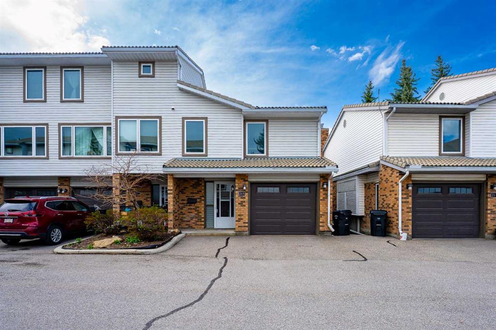 Picture of 215 Coachway Lane SW, Calgary Real Estate Listing