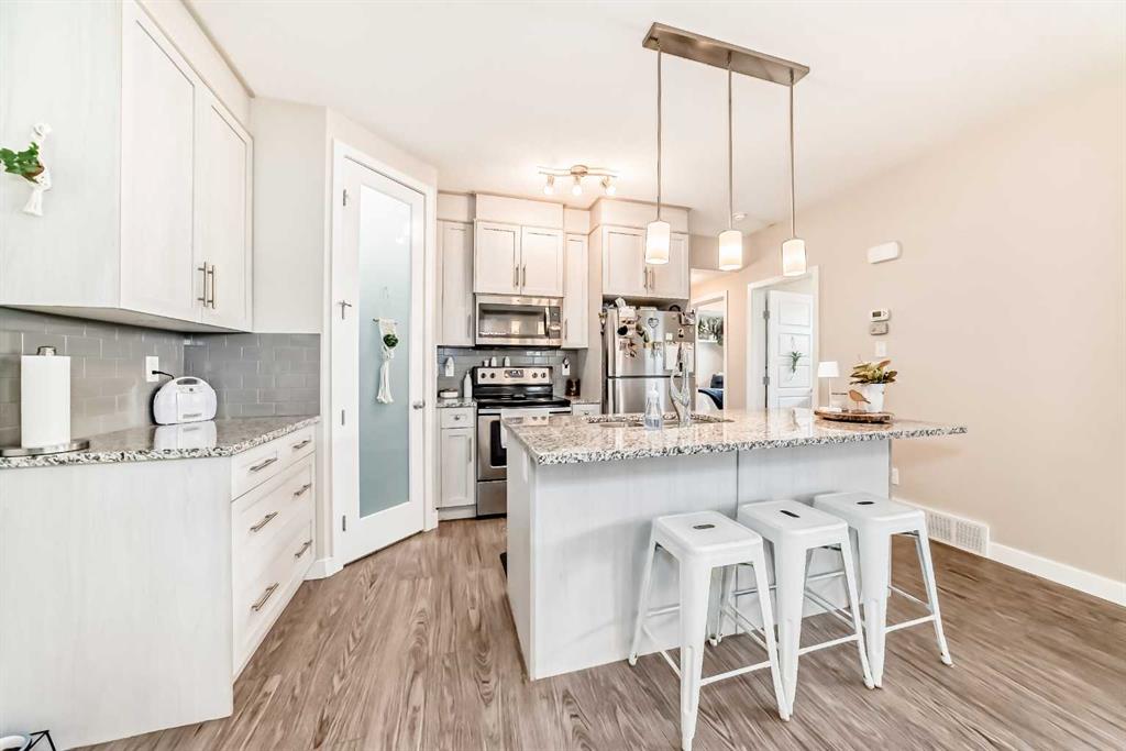 Picture of 1102, 2461 Baysprings Link SW, Airdrie Real Estate Listing