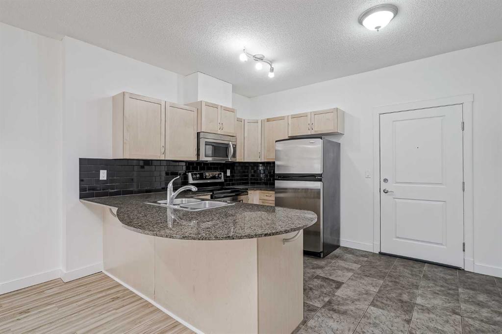 Picture of 1609, 11811 Lake Fraser Drive SE, Calgary Real Estate Listing