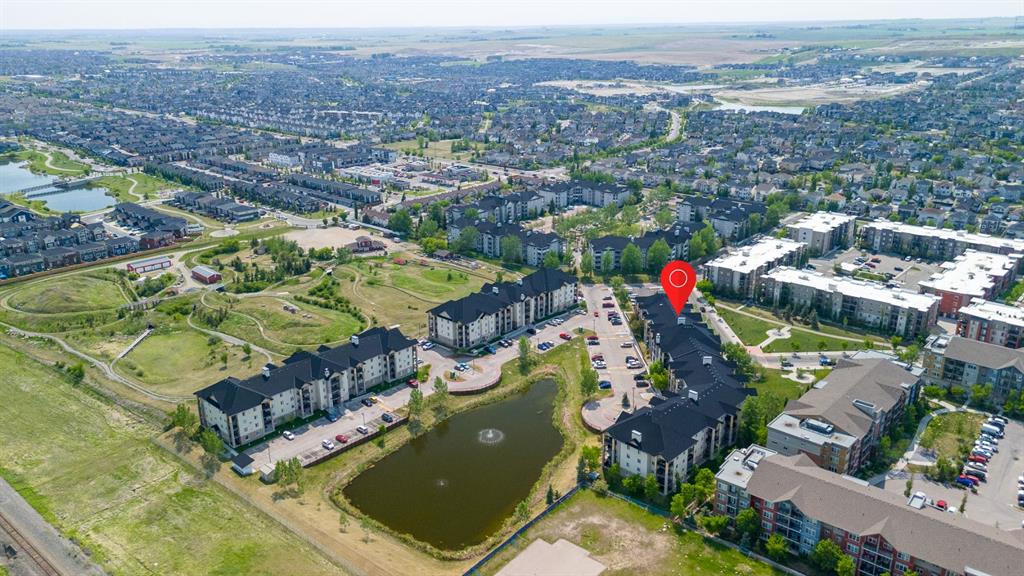 Picture of 8213, 304 Mackenzie Way SW, Airdrie Real Estate Listing
