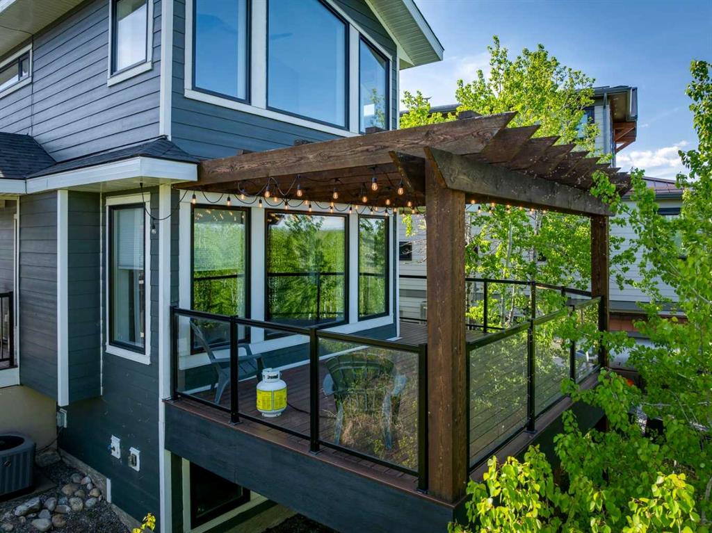 Picture of 243 Cottageclub Crescent , Rural Rocky View County Real Estate Listing