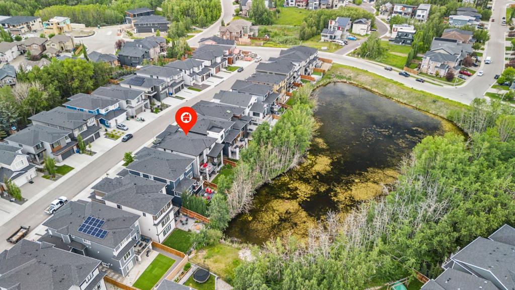 Picture of 105 Rock Lake Heights NW, Calgary Real Estate Listing