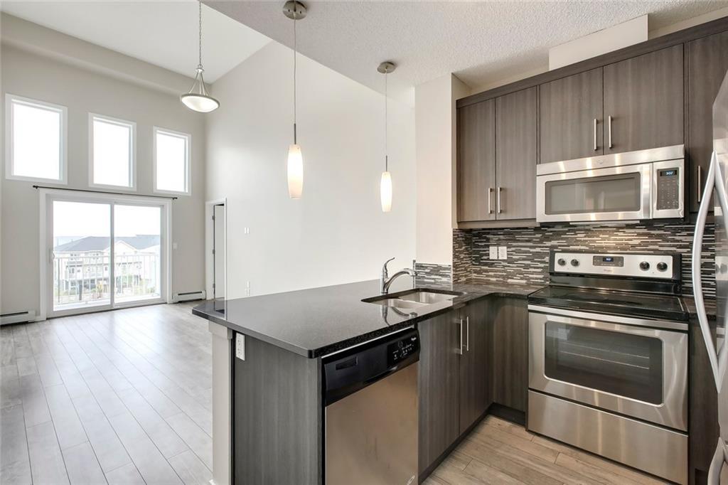 Picture of 405, 402 MARQUIS Lane SE, Calgary Real Estate Listing