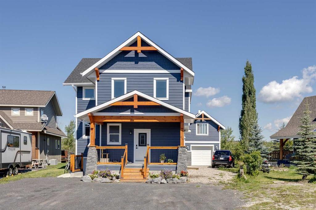 Picture of 216 Cottageclub Crescent , Rural Rocky View County Real Estate Listing