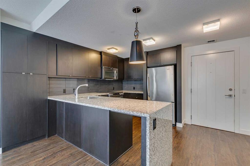 Picture of 107, 25 Aspenmont Heights SW, Calgary Real Estate Listing