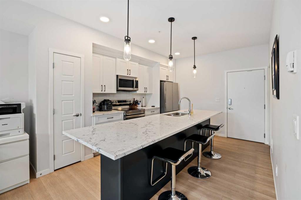 Picture of 411, 200 Harvest Hills Place NE, Calgary Real Estate Listing