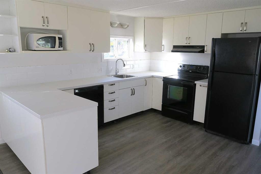 Picture of 901 Briarwood Crescent , Strathmore Real Estate Listing