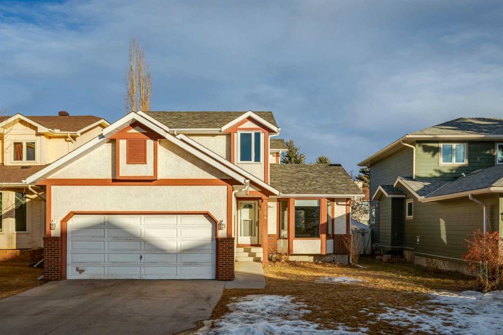 Picture of 124 Woodmark Crescent SW, Calgary Real Estate Listing
