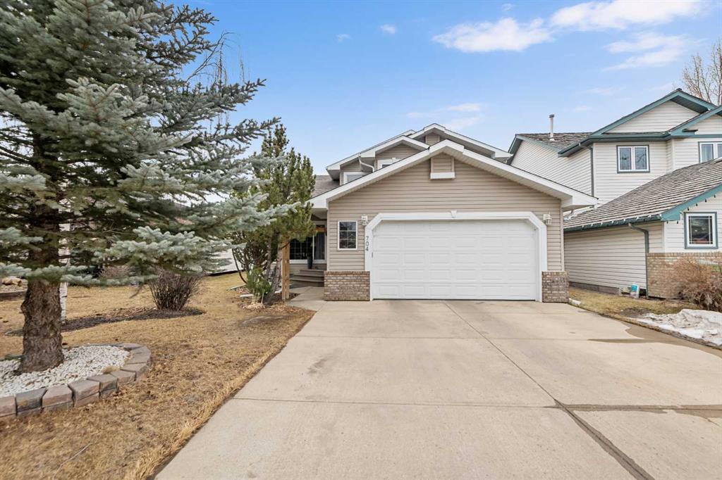 Picture of 704 Woodside Drive , Airdrie Real Estate Listing