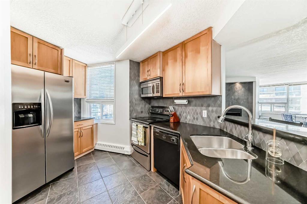 Picture of 703, 626 15 Avenue SW, Calgary Real Estate Listing