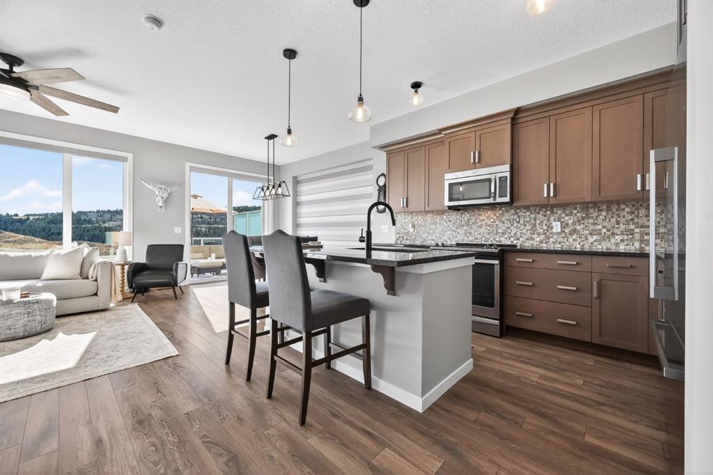 Picture of 205 Sunset Point , Cochrane Real Estate Listing