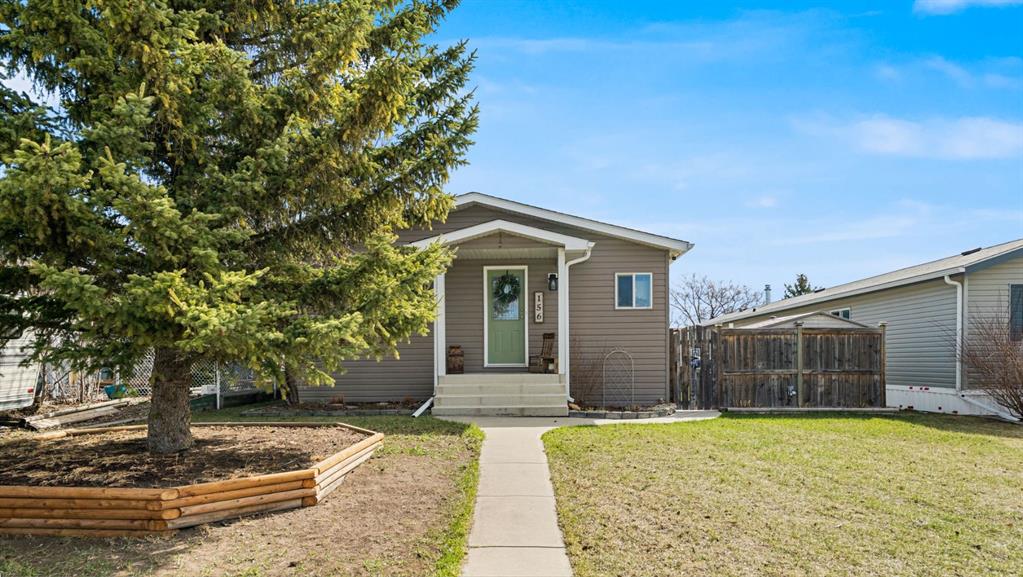 Picture of 156 Meadowlark Lane , Carstairs Real Estate Listing