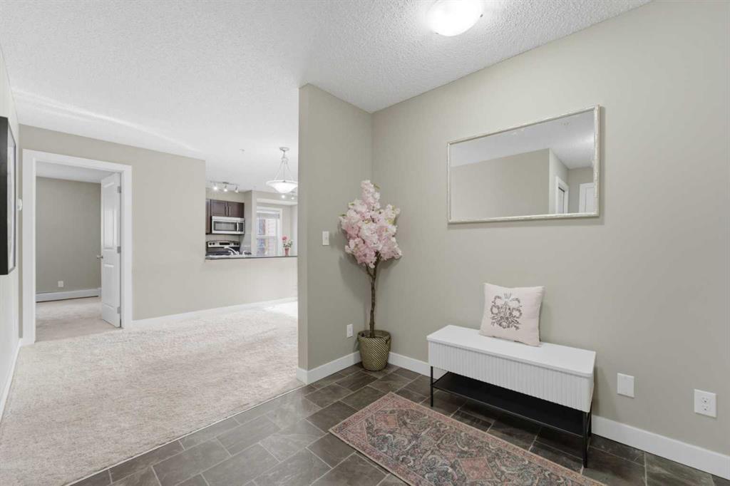 Picture of 8201, 403 Mackenzie Way SW, Airdrie Real Estate Listing
