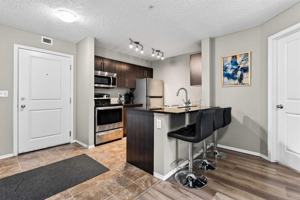 Picture of 9103, 403 Mackenzie Way SW, Airdrie Real Estate Listing