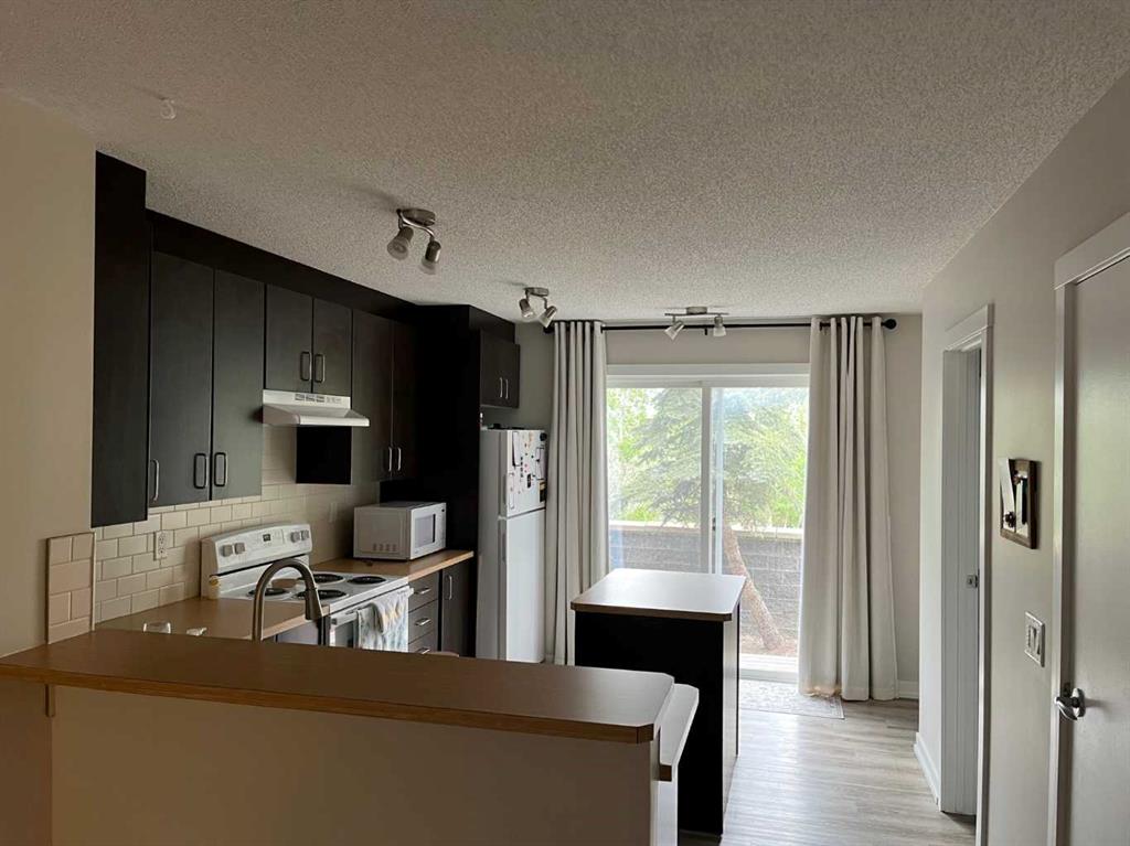 Picture of 303, 2445 Kingsland Road SE, Airdrie Real Estate Listing