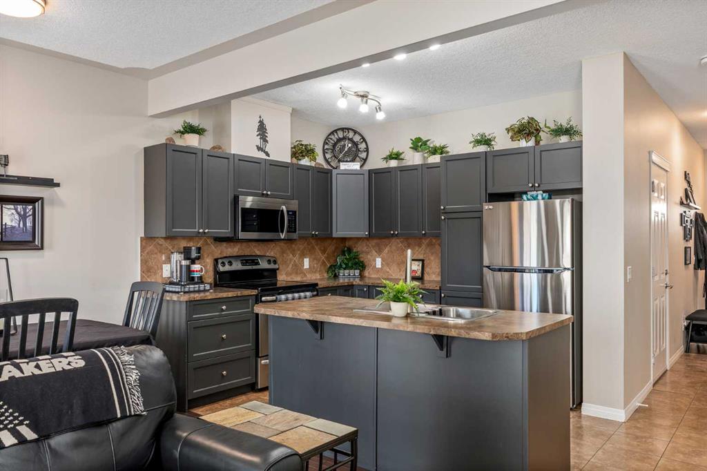 Picture of 604, 620 Luxstone Landing SW, Airdrie Real Estate Listing