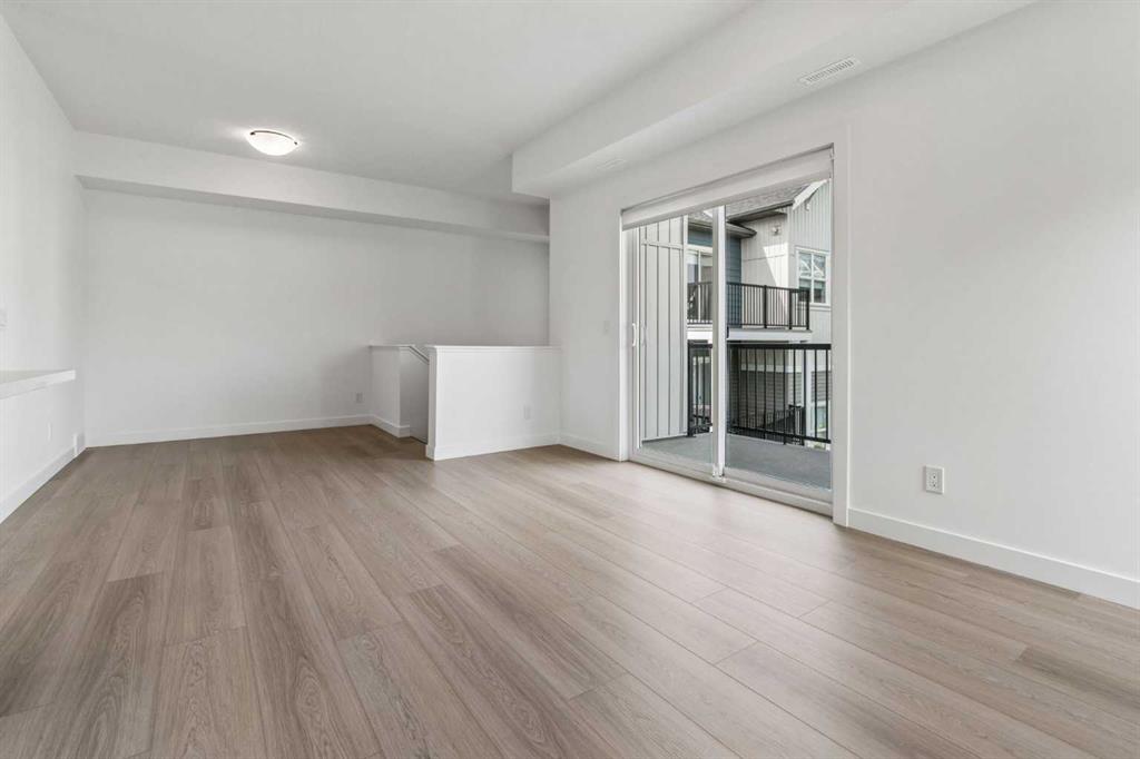 Picture of 1002, 24 Rivercrest Drive , Cochrane Real Estate Listing