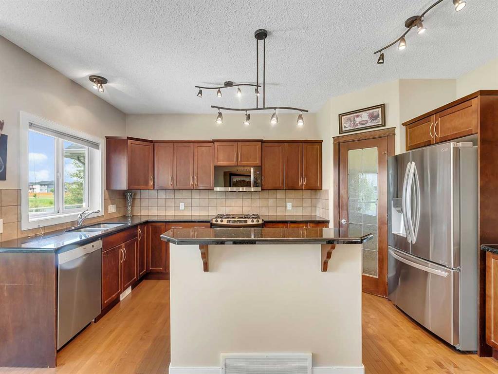 Picture of 212 Springmere Road , Chestermere Real Estate Listing