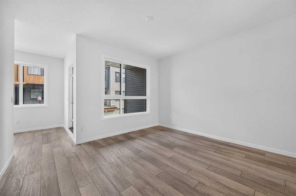Picture of 405, 81 MIDTOWN Boulevard SW, Airdrie Real Estate Listing