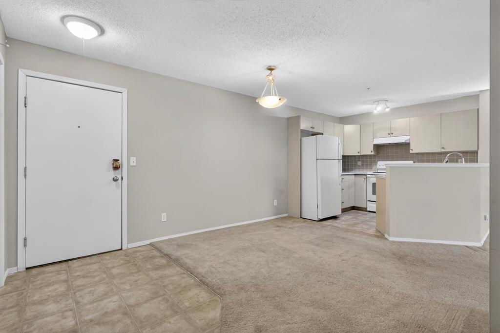 Picture of 7103, 304 Mackenzie Way SW, Airdrie Real Estate Listing