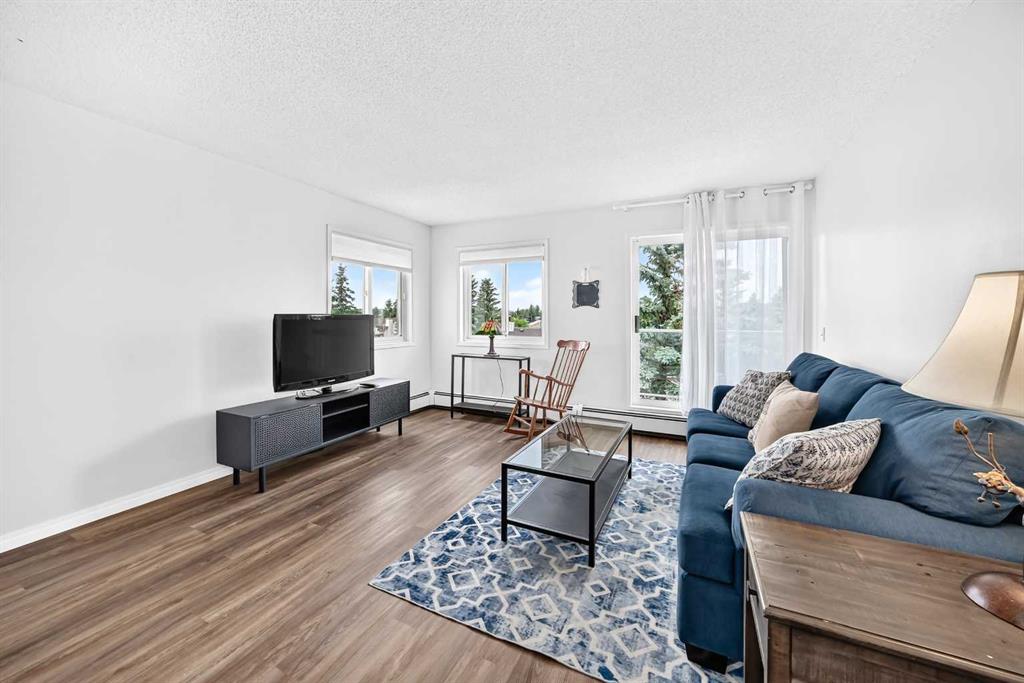 Picture of 307, 309 Woodside Drive NW, Airdrie Real Estate Listing