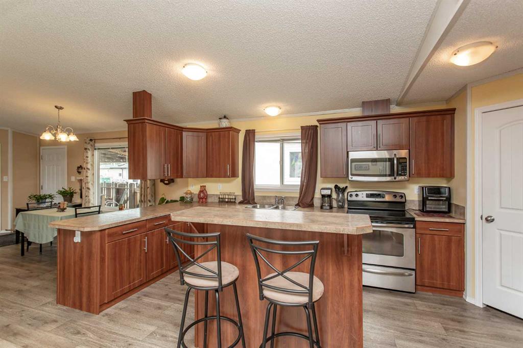 Picture of 65, 15 Mackenzie Ranch Way , Lacombe Real Estate Listing