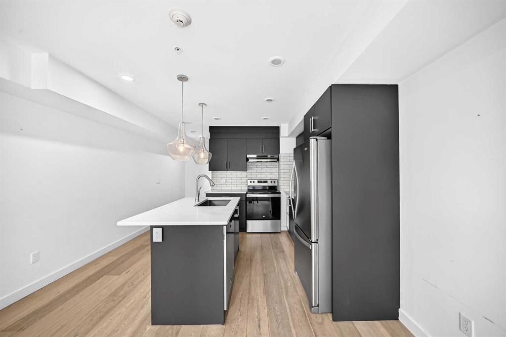 Picture of 108, 1632 20 Avenue NW, Calgary Real Estate Listing