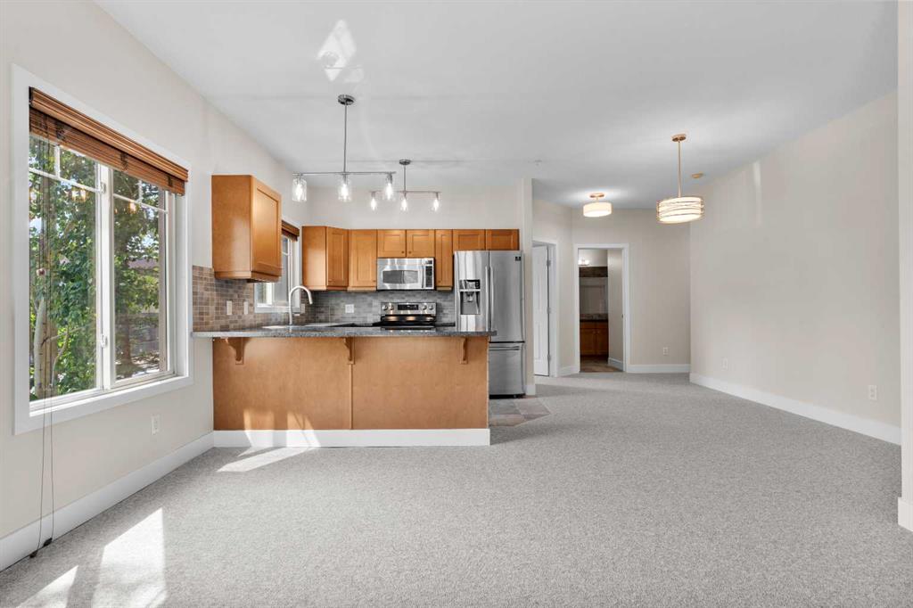 Picture of 4203, 92 Crystal Shores Road , Okotoks Real Estate Listing