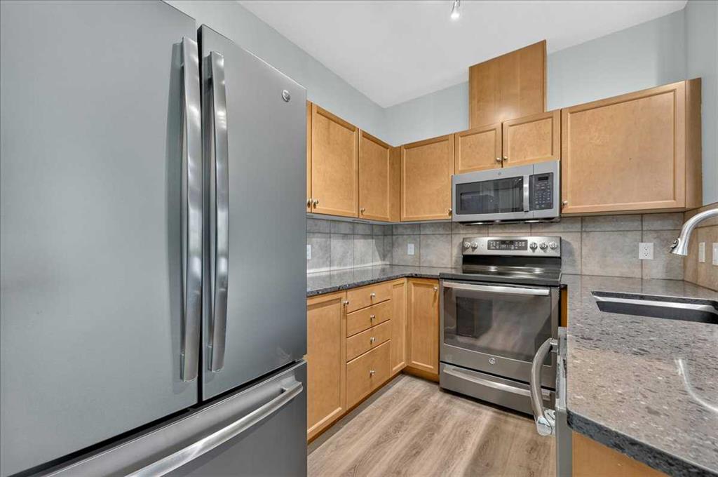 Picture of 4210, 92 Crystal Shores Road , Okotoks Real Estate Listing