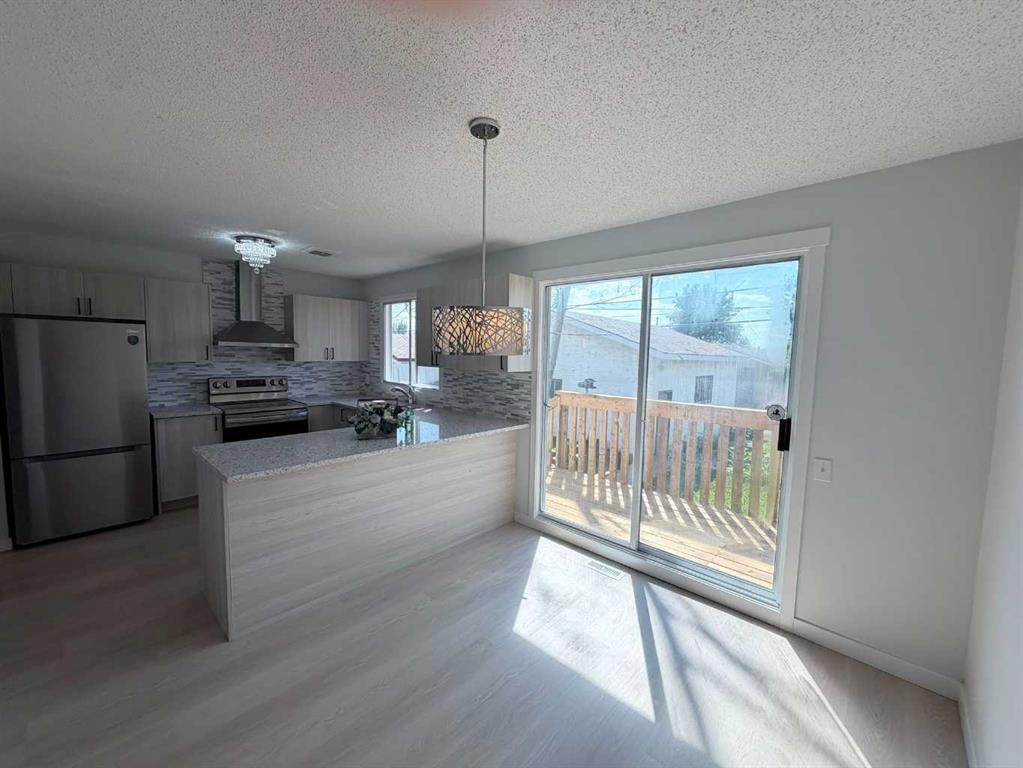 Picture of 215 Penbrooke Way SE, Calgary Real Estate Listing