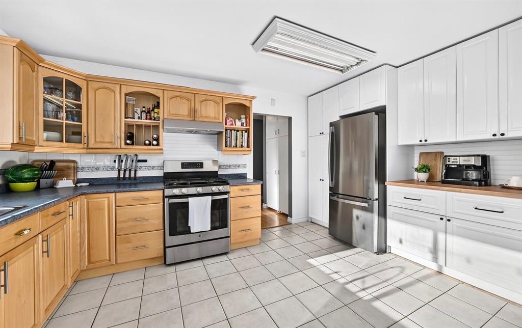 Picture of 411 Woodland Crescent SE, Calgary Real Estate Listing