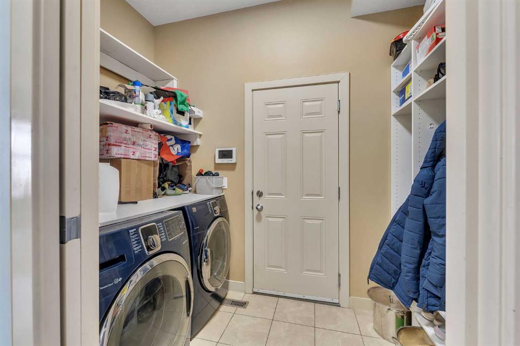 Picture of 156 Bishop Crescent NW, Langdon Real Estate Listing