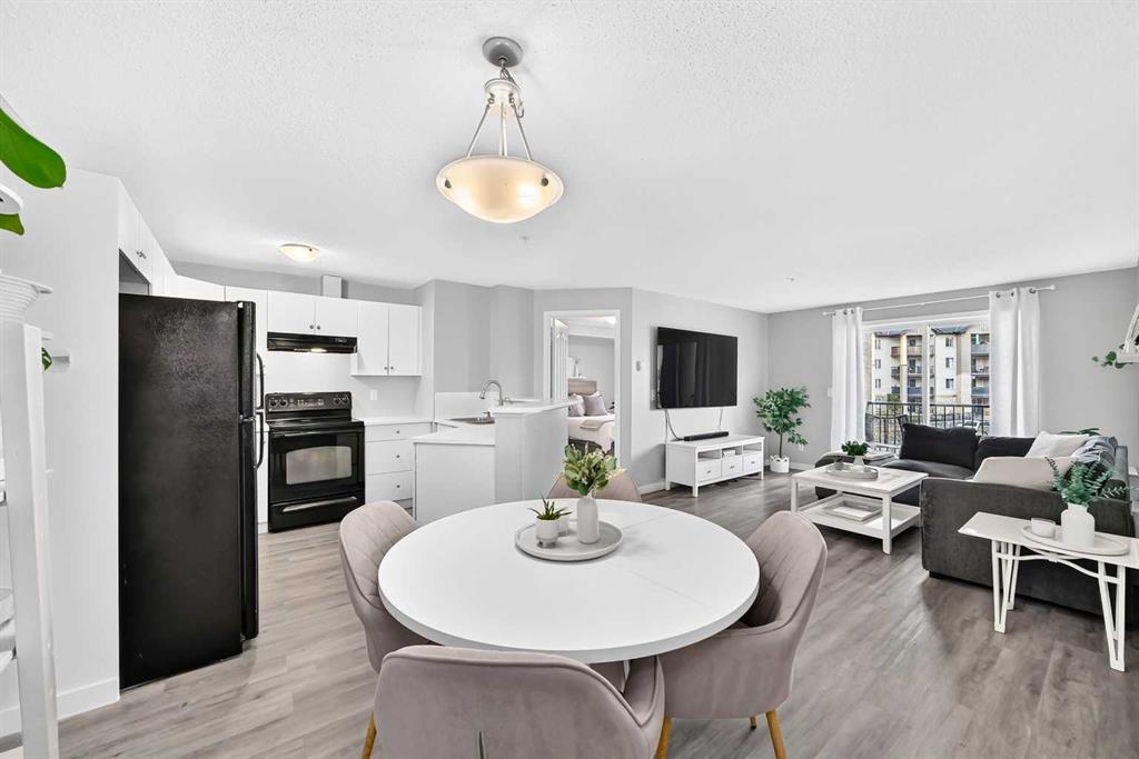 Picture of 7205, 304 Mackenzie Way SW, Airdrie Real Estate Listing