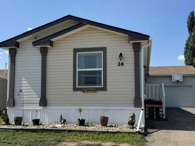 Picture of 26, 15 Mackenzie Ranch Way , Lacombe Real Estate Listing