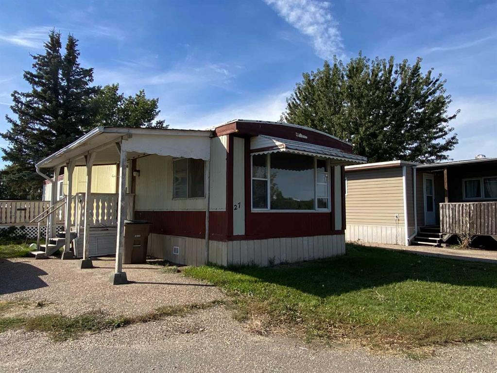 Picture of 27 LAKE STAFFORD Crescent E, Brooks Real Estate Listing