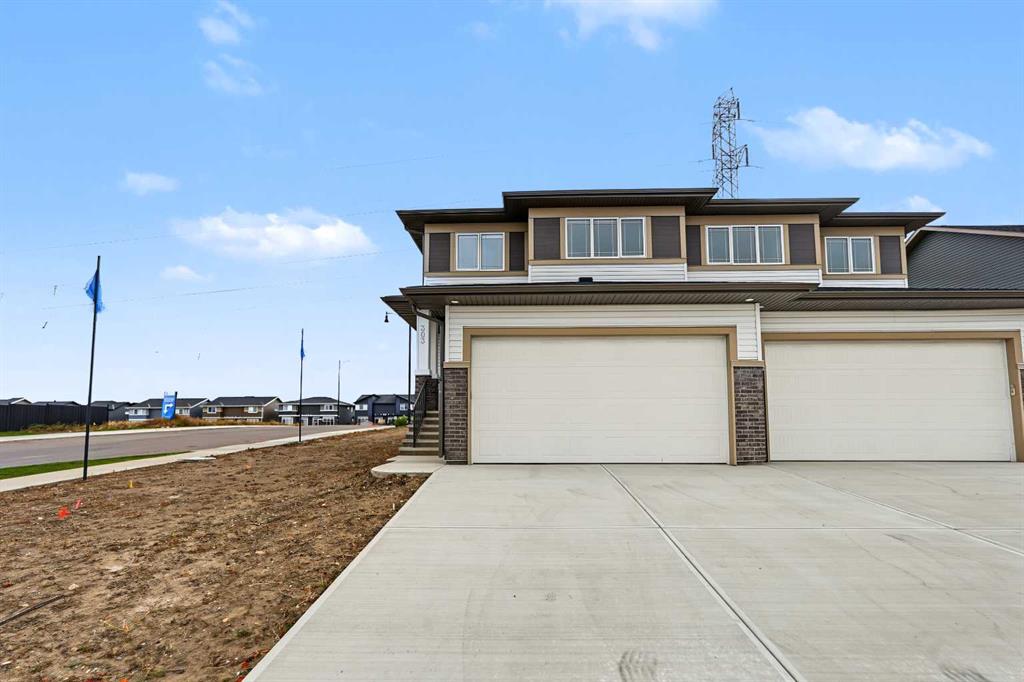 Picture of 303 Dawson Dock Way , Chestermere Real Estate Listing