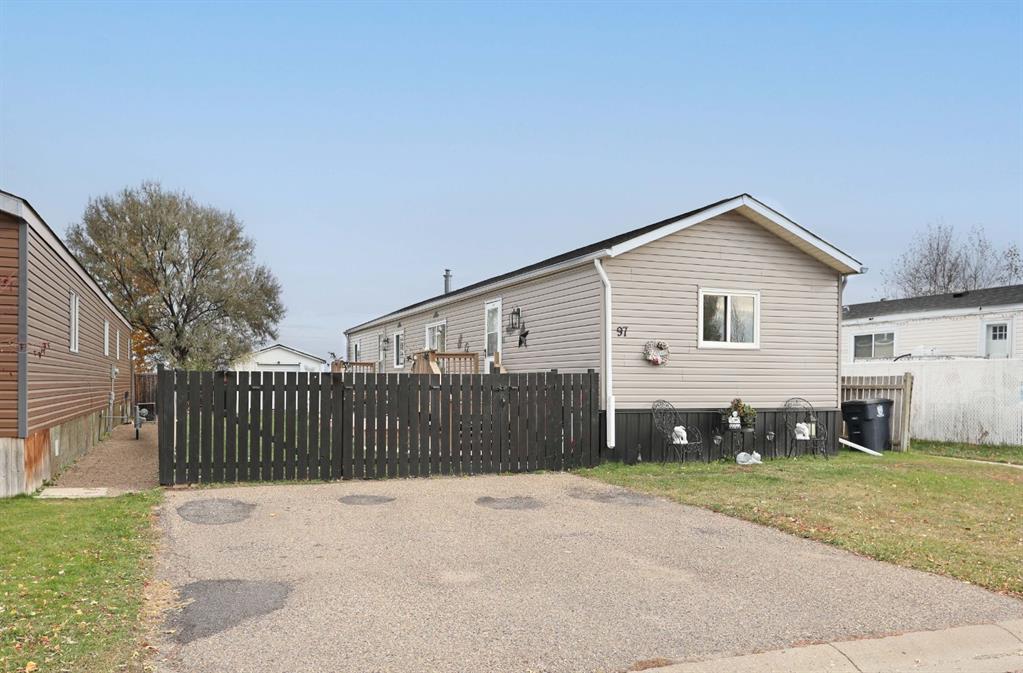 Picture of 97 Meadow Lake Close E, Brooks Real Estate Listing