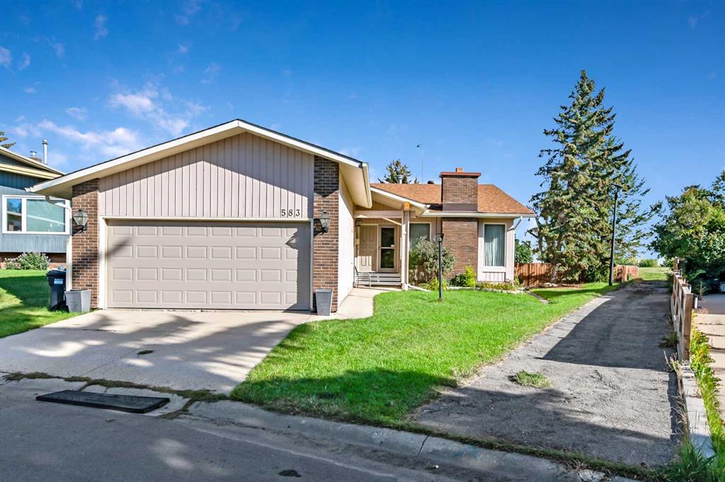 Picture of 583 Woodpark Crescent SW, Calgary Real Estate Listing