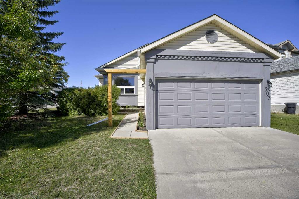 Picture of 703 Woodside Drive NW, Airdrie Real Estate Listing