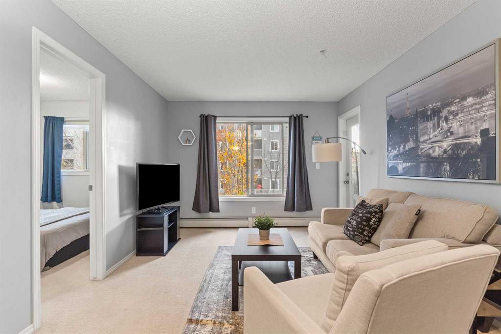 Picture of 9211, 403 Mackenzie Way , Airdrie Real Estate Listing