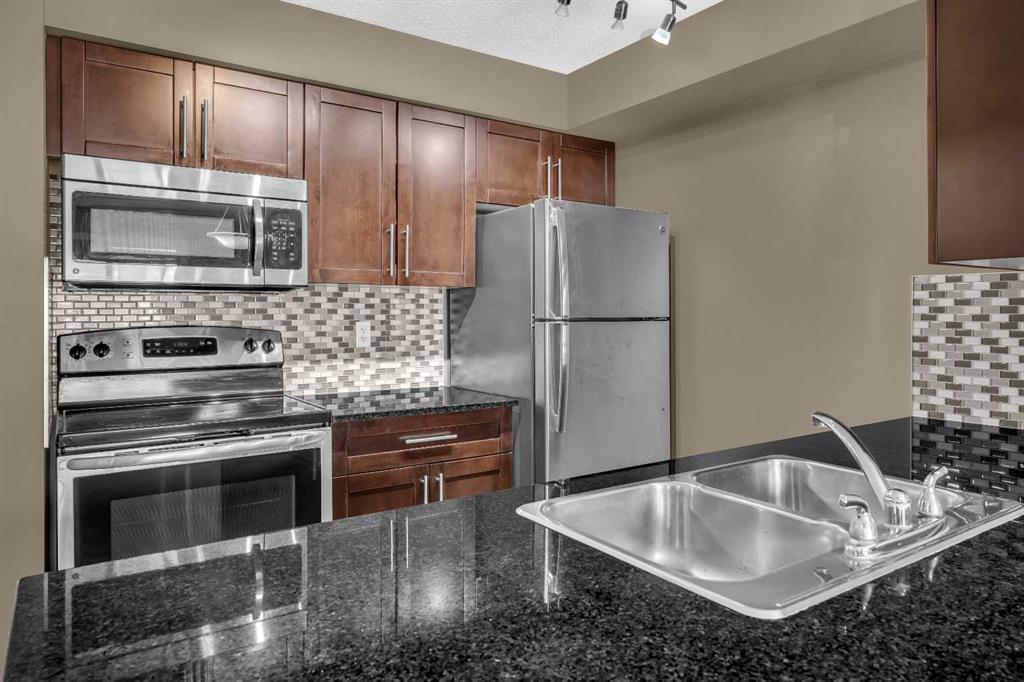 Picture of 9212, 403 Mackenzie Way , Airdrie Real Estate Listing
